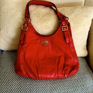 Poppy red coach leather hobo style